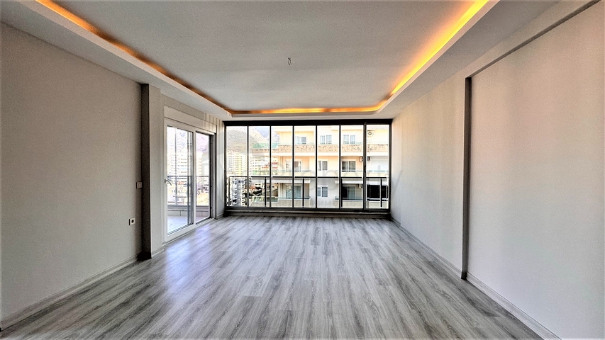 Пентхаус 2+1 в центре Махмутлара с видом на горы 