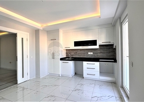 Пентхаус 2+1 в центре Махмутлара с видом на горы 