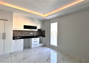 Пентхаус 2+1 в центре Махмутлара с видом на горы 