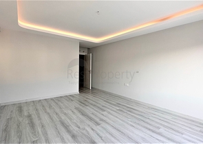 Пентхаус 2+1 в центре Махмутлара с видом на горы 