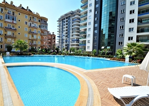 Пентхаус 2+1 в центре Махмутлара с видом на горы 