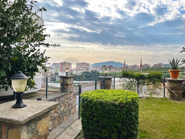 Шикарный садовый дуплекс 3+1 в районе Джикджилли