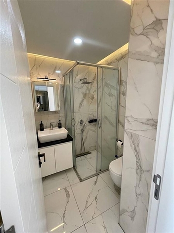 Квартира 1+1 в центре Алании в новом доме