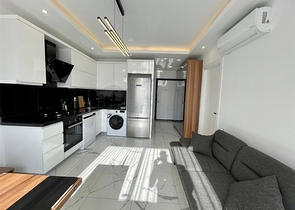 Квартира 1+1 в центре Алании в новом доме