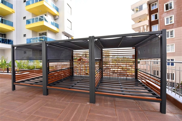 Квартира 1+1 в новом комплексе в районе Махмутлар