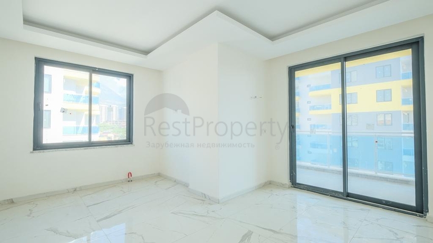 Квартира 1+1 в новом комплексе в районе Махмутлар