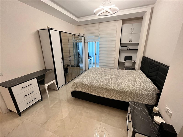 Трехкомнатная квартира в Махмутларе 