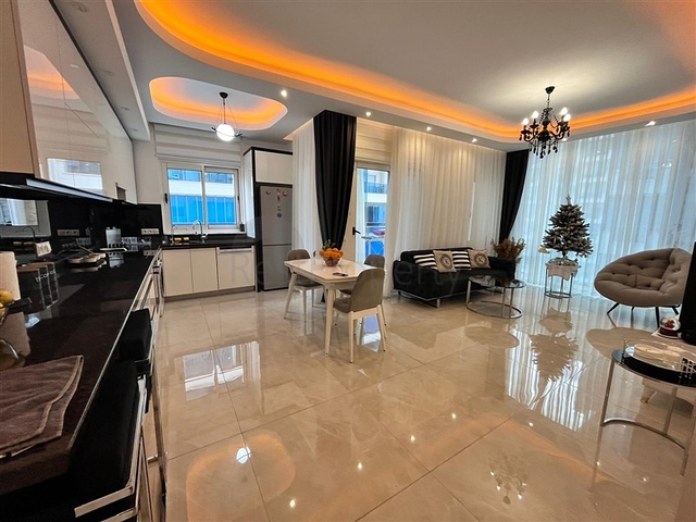 Трехкомнатная квартира в Махмутларе 