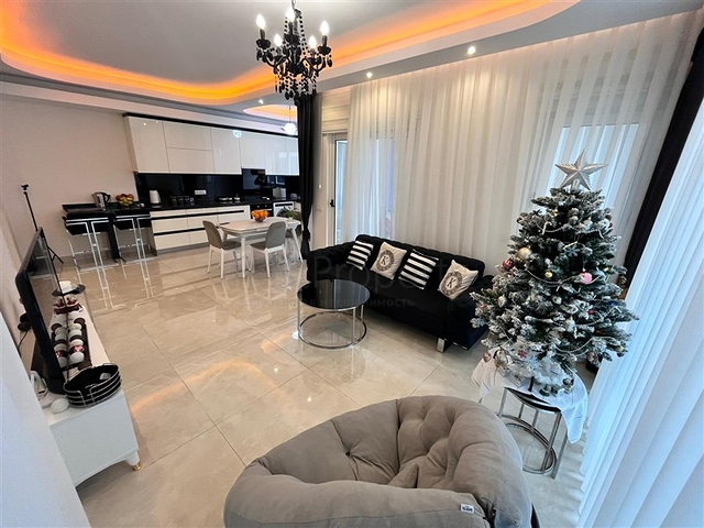 Трехкомнатная квартира в Махмутларе 