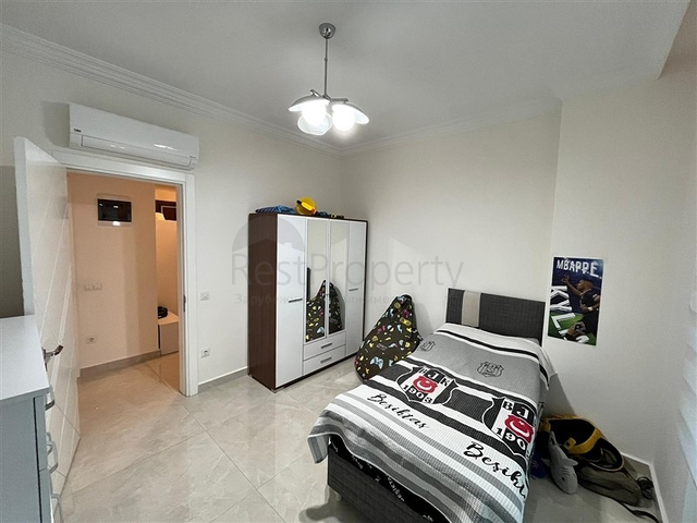 Трехкомнатная квартира в Махмутларе 