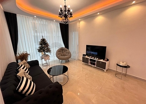 Трехкомнатная квартира в Махмутларе 