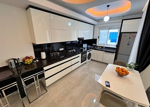 Трехкомнатная квартира в Махмутларе 