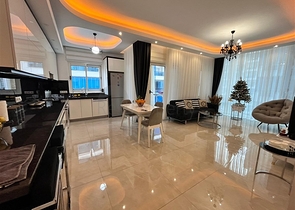 Трехкомнатная квартира в Махмутларе 