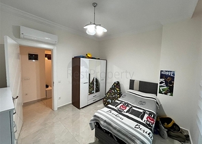 Трехкомнатная квартира в Махмутларе 