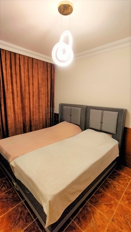 Меблированные апартаменты 2+1 с видом на море в Тосмуре