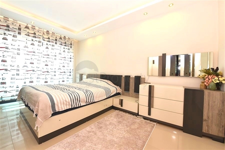 Апартаменты 2+1 в респектабельном комплексе в 50 метрах от пляжа района Каргыджак 