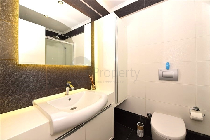 Апартаменты 2+1 в респектабельном комплексе в 50 метрах от пляжа района Каргыджак 