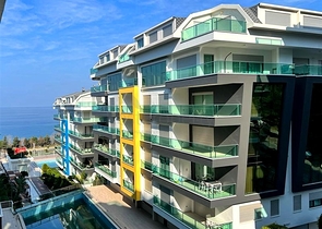 Апартаменты 2+1 в респектабельном комплексе в 50 метрах от пляжа района Каргыджак 