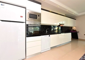 Апартаменты 2+1 в респектабельном комплексе в 50 метрах от пляжа района Каргыджак 