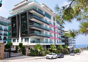 Апартаменты 2+1 в респектабельном комплексе в 50 метрах от пляжа района Каргыджак 