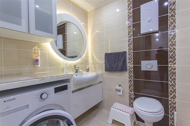 Квартира планировкой 1+1 в районе Махмутлар