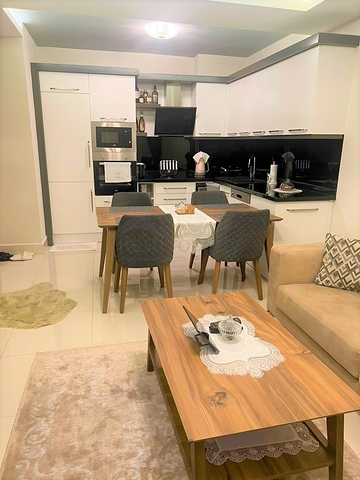 Квартира 1+1 в шикарном комплексе в районе Тосмур