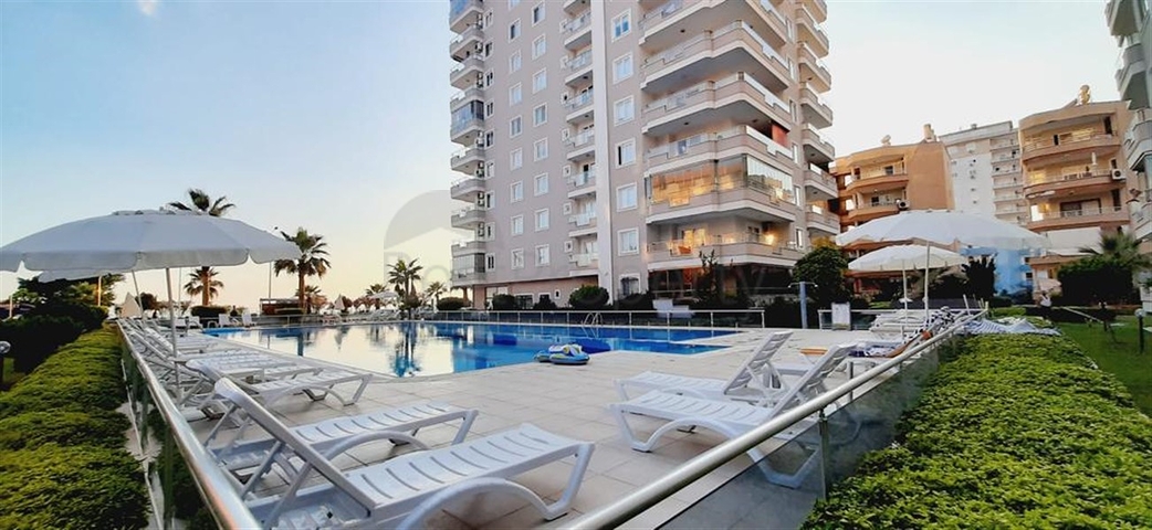 Квартира 2+1 на первой линии в районе Махмутлар