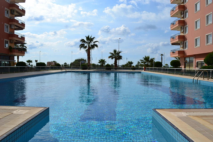 Квартира 2+1 на первой линии в районе Махмутлар