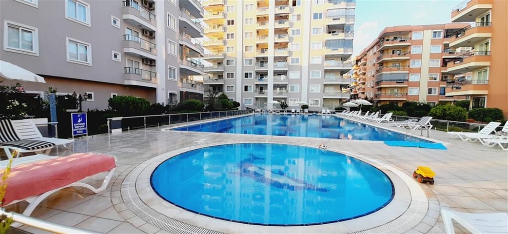 Квартира 2+1 на первой линии в районе Махмутлар