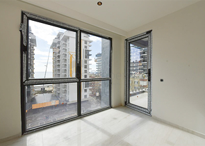 Квартира 1+1 на первой береговой линии в Махмутларе