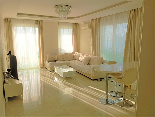 Квартира 2+1 в районе Махмутлар с панорамным видом на море