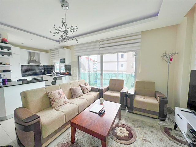 Меблированная квартира 1+1 с видом на море в районе Кестель