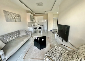 Шикарная квартира планировкой 1+1 в районе Оба  