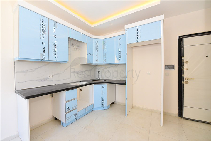 Квартира 1+1 в районе Махмутлар