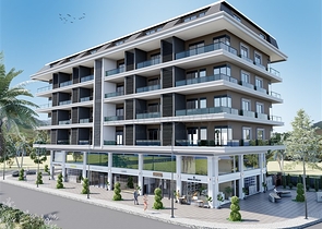 Квартира планировкой 1+1 в строящемся доме района Махмутлар