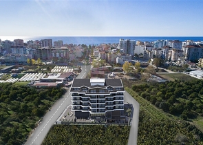 Квартира планировкой 1+1 в строящемся доме района Махмутлар