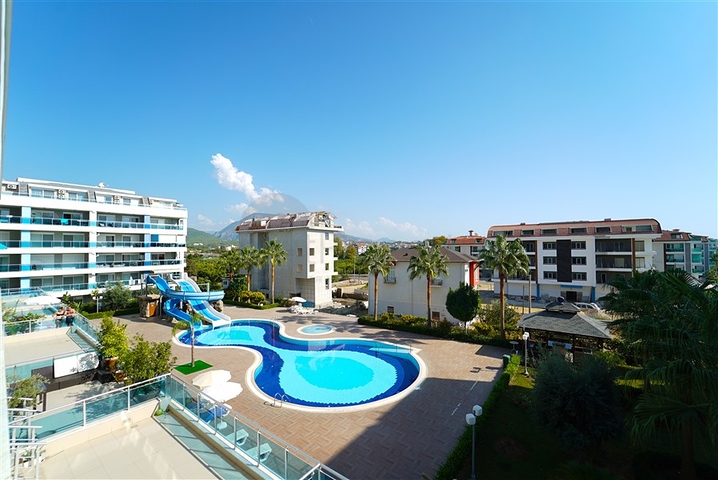 Двухкомнатная комната с мебелью и бытовой техникой