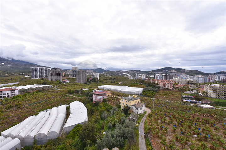 Квартира планировкой 1+1 в районе Махмутлар