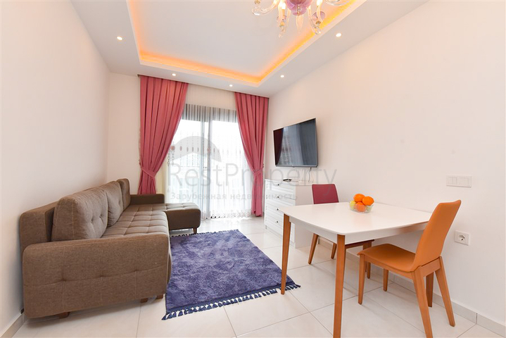 Квартира планировкой 1+1 в районе Махмутлар