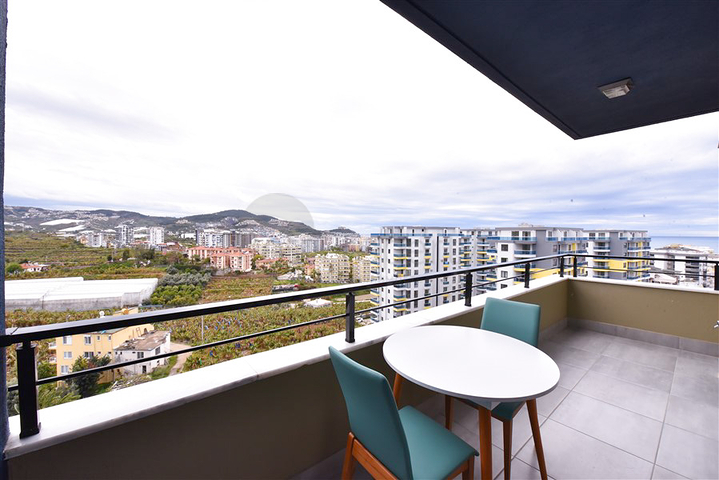 Квартира планировкой 1+1 в районе Махмутлар