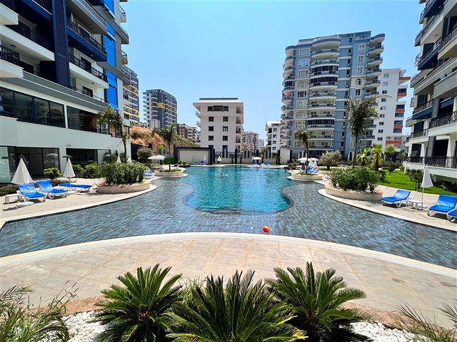 Квартира планировкой 1+1 в районе Махмутлар