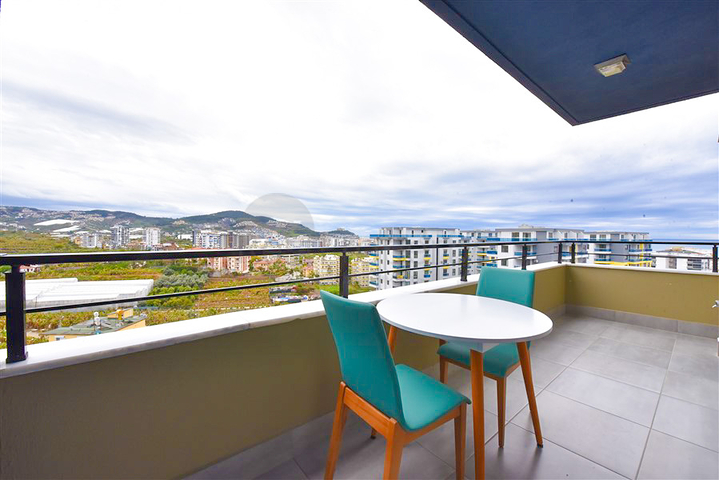 Квартира планировкой 1+1 в районе Махмутлар