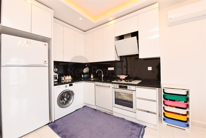 Квартира планировкой 1+1 в районе Махмутлар