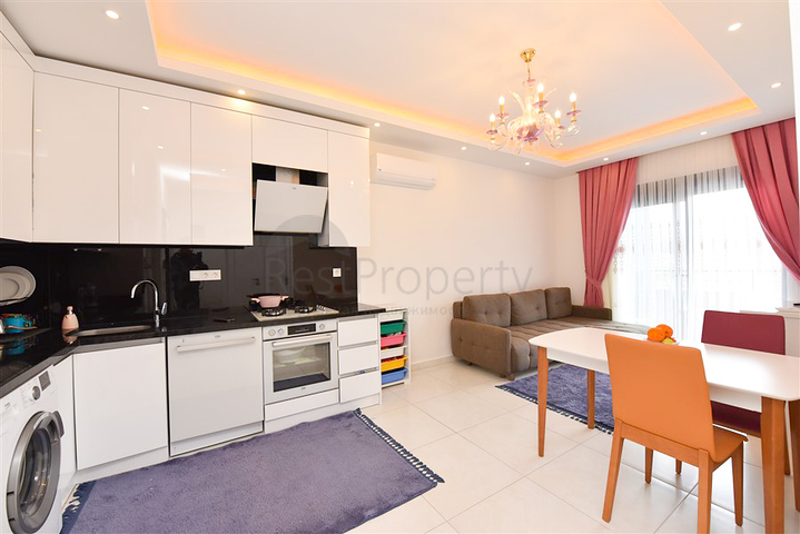 Квартира планировкой 1+1 в районе Махмутлар