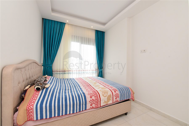 Квартира планировкой 1+1 в районе Махмутлар