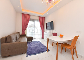 Квартира планировкой 1+1 в районе Махмутлар