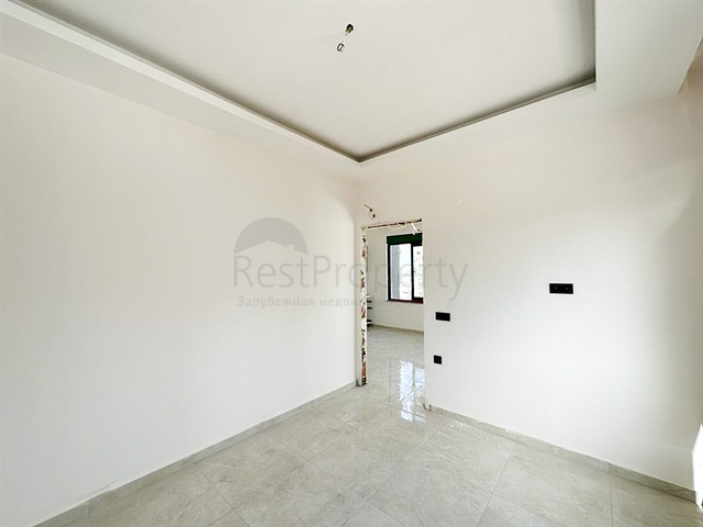 Квартира планировкой 1+1 в строящемся доме в районе Махмутлар