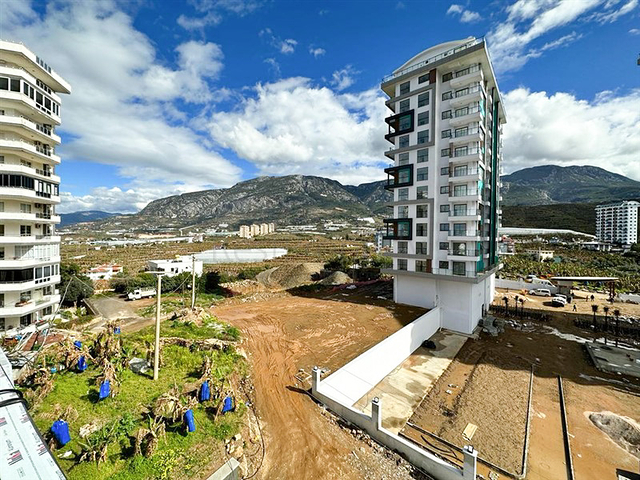 Квартира планировкой 1+1 в строящемся доме в районе Махмутлар