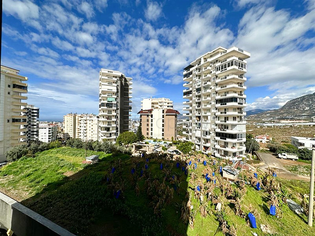 Квартира планировкой 1+1 в строящемся доме в районе Махмутлар