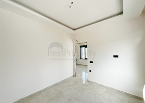 Квартира планировкой 1+1 в строящемся доме в районе Махмутлар